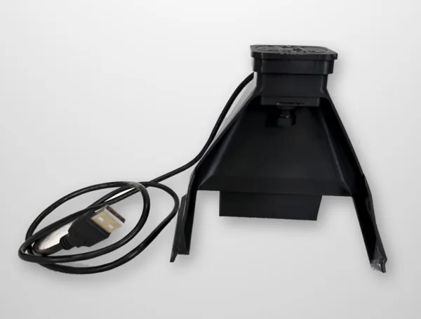 A printed FreeDrop hood with the camera fitted and its USB cable